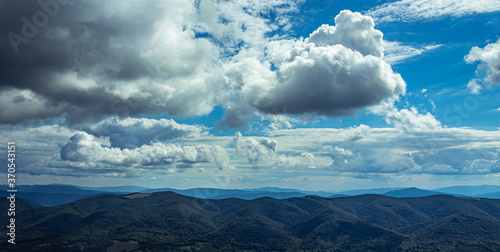 Fototapeta Naklejka Na Ścianę i Meble -  Mountain landscape with beautiful sky and clouds. Panorama of Bieszczady in Poland.