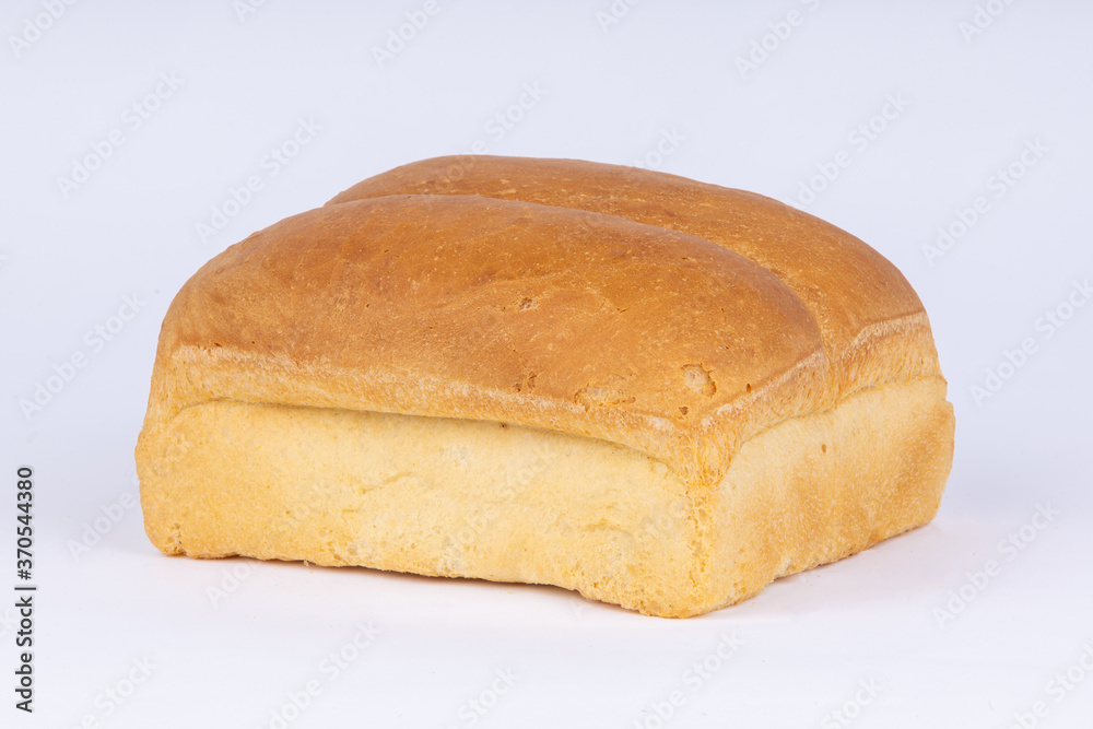 double loaf of fresh wheat bread on a white background double loaf of fresh wheat bread on a white background