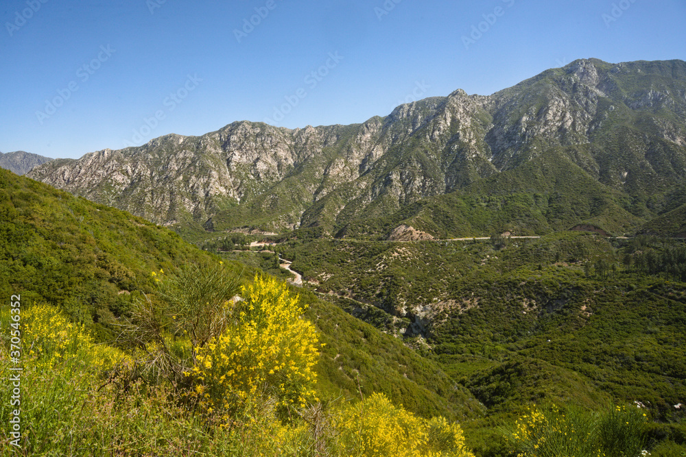 Angeles forest national park panoramic landscape, with mountain range peaks, changing terrain, of valleys rolling hills with trees, plants and mount brush. Scenic views  and beautiful,