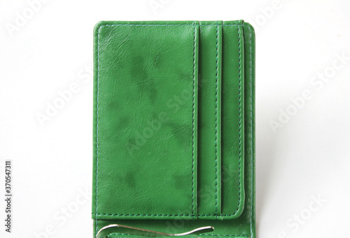 Open green wallet isolated on white background . Blank wallet . 