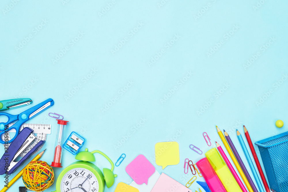 back to school stationery on blue background school, university, copy space