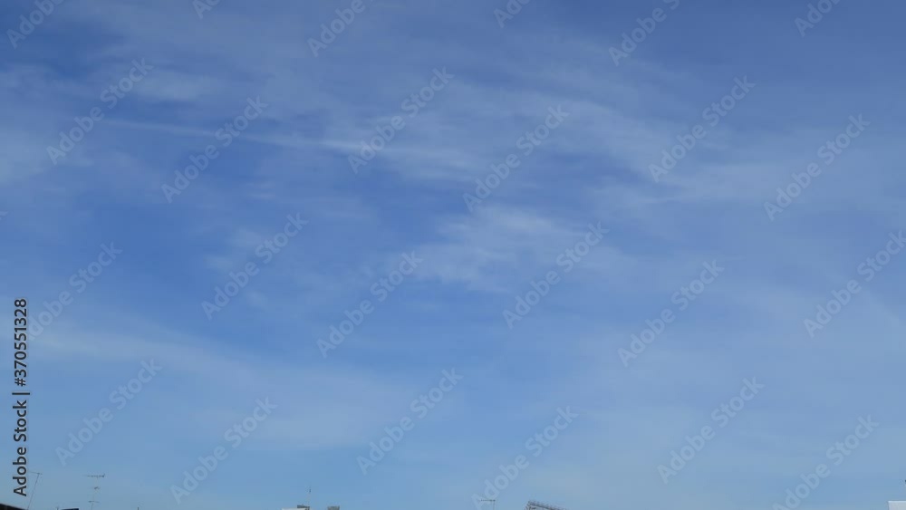Sunny clear blue sky TimeLapse of fast moved cirrus or cirrostratus cloud & cumulus or cirrocumulus white cloudscape in tropical summer sunlight & sun ray at sunny daylight & sunshine day, B-roll   