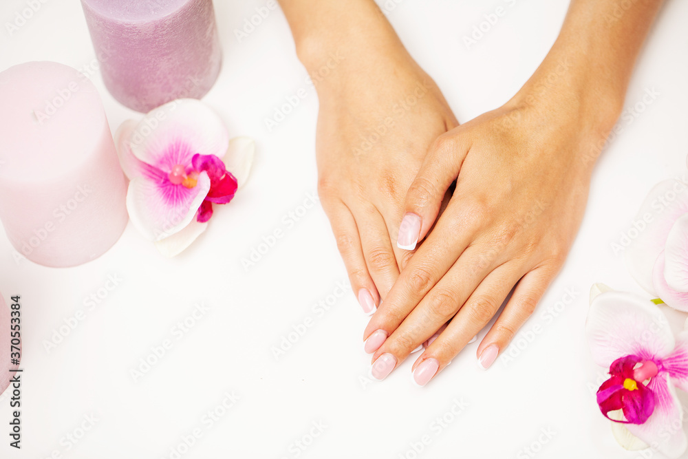Close up image of woman using nail buffer when doing manicure, polishing nails at home. Close up image of woman using nail buffer when doing manicure, polishing nails at home.