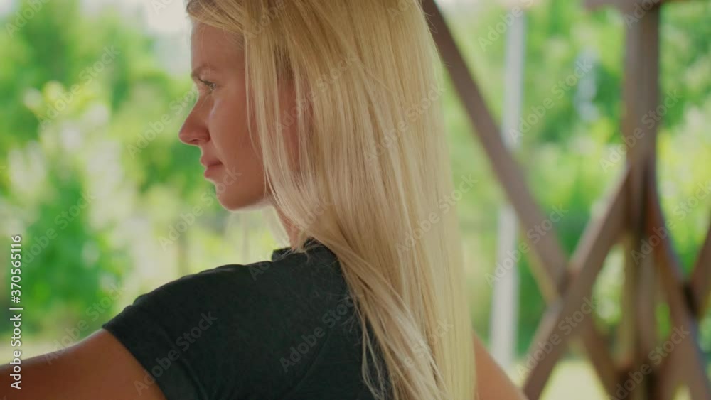 Portrait of a blonde Girl doing hand exercises, Slow-motion fitness, Pilates, crossfit Portrait of a blonde Girl doing hand exercises, Slow-motion fitness, Pilates, crossfit