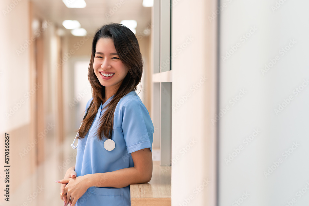 Asian doctor woman portrait. female doctor or nurse wearing a uniform and stethoscope working in hospital. Asian doctor woman portrait. female doctor or nurse wearing a uniform and stethoscope working in hospital.