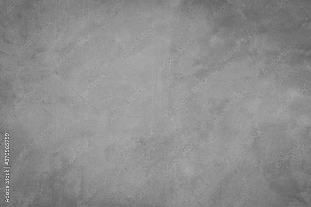 Fototapeta premium Texture of gray concrete wall surface. Some crack and scratch, suitable for use as a pattern or background image.