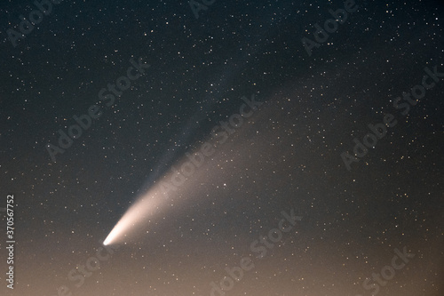 Neowise Comet and its long dust tail after dusk from Etna volcano