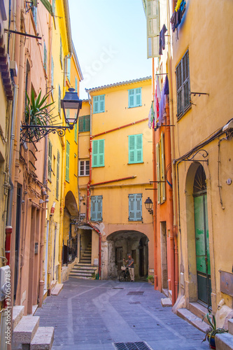 Colorful buildings in the mediaeval town of Menton, French Riviera city in the Mediterranean, France. © whatafoto