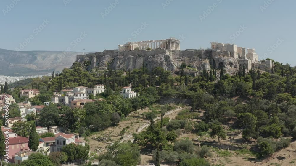 Slow Aerial Dolly towards Mountain with Acropolis of Athens in Greece at Daylight Slow Aerial Dolly towards Mountain with Acropolis of Athens in Greece at Daylight