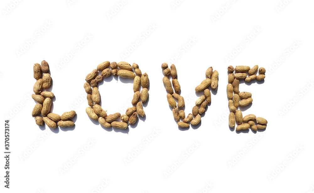 Love word written with Peanuts on white background in horizontal orientation, Perfect for Wallpaper Love word written with Peanuts on white background in horizontal orientation, Perfect for Wallpaper