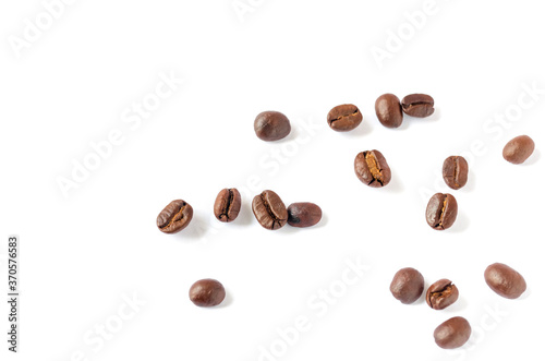 Roasted coffee beans on wooden texture background.