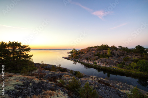 Panoramic view of coastal landscape after sunset