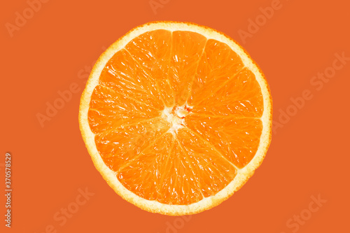 Half orange on orange color background.