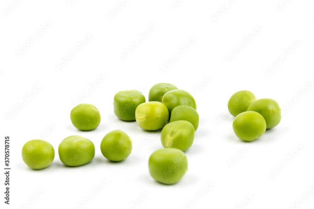 Green young peas, isolated on white background. Close-up. Top view Green young peas, isolated on white background. Close-up. Top view