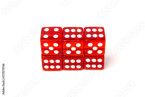 Transparent and red glass dices isolated on white background. © Olga