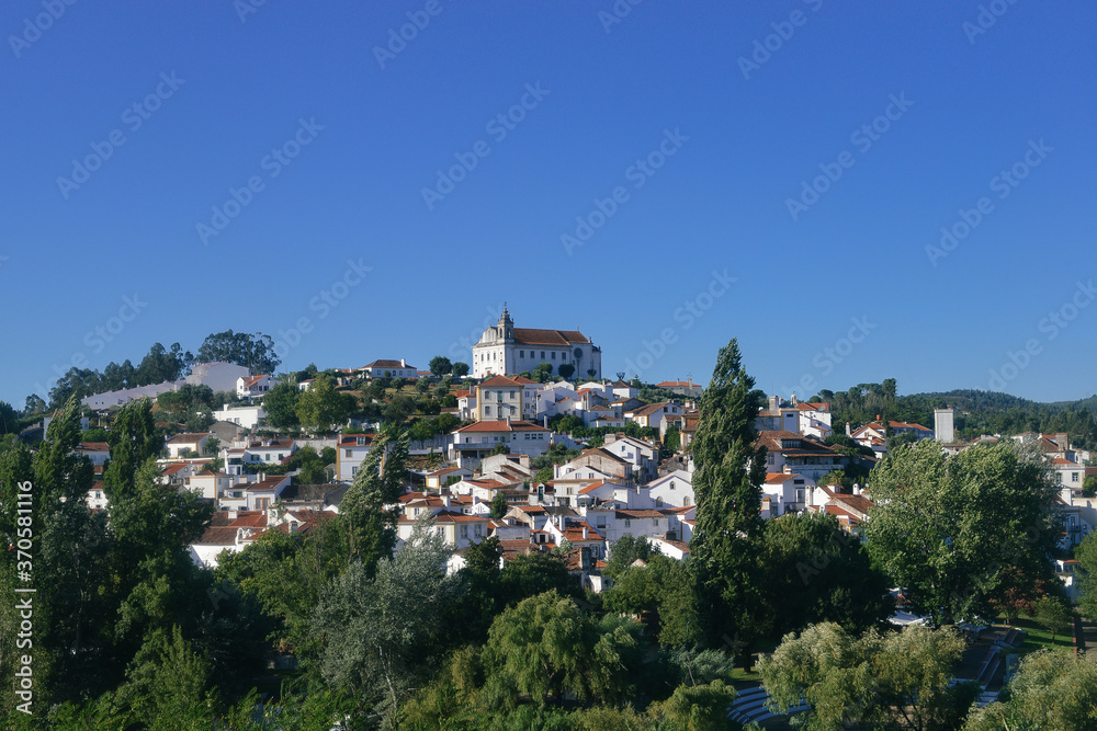 View of traditional limestone cozy yellow and white houses at Constancia in the Santarem District of Portugal