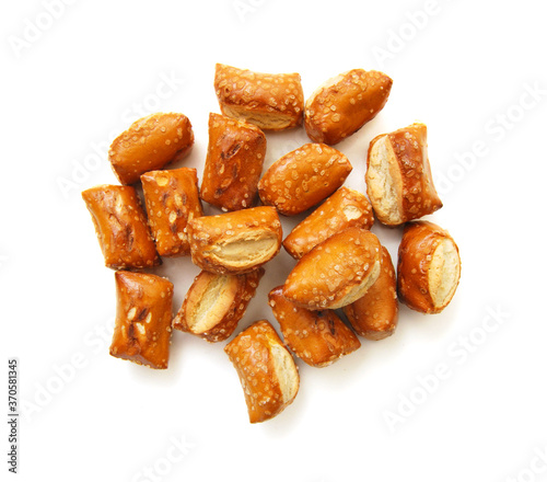 Cheese filled, bite-sized pretzel sticks on white background