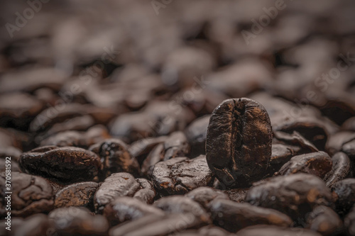 Fototapeta Naklejka Na Ścianę i Meble -  Roasted coffee beans background, can be used as a background. Close Up.	