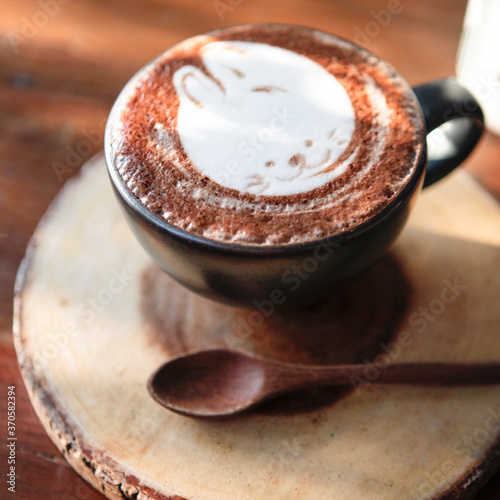 Cup of hot chocolate on wooden