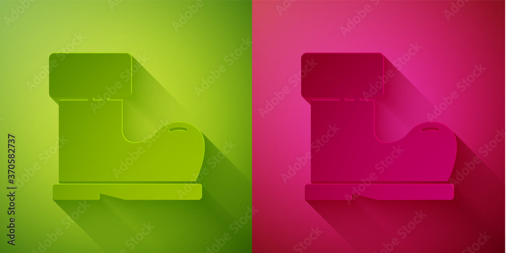 Paper cut Waterproof rubber boot icon isolated on green and pink background. Gumboots for rainy weather, fishing, gardening. Paper art style. Vector Illustration. Paper cut Waterproof rubber boot icon isolated on green and pink background. Gumboots for rainy weather, fishing, gardening. Paper art style. Vector Illustration.