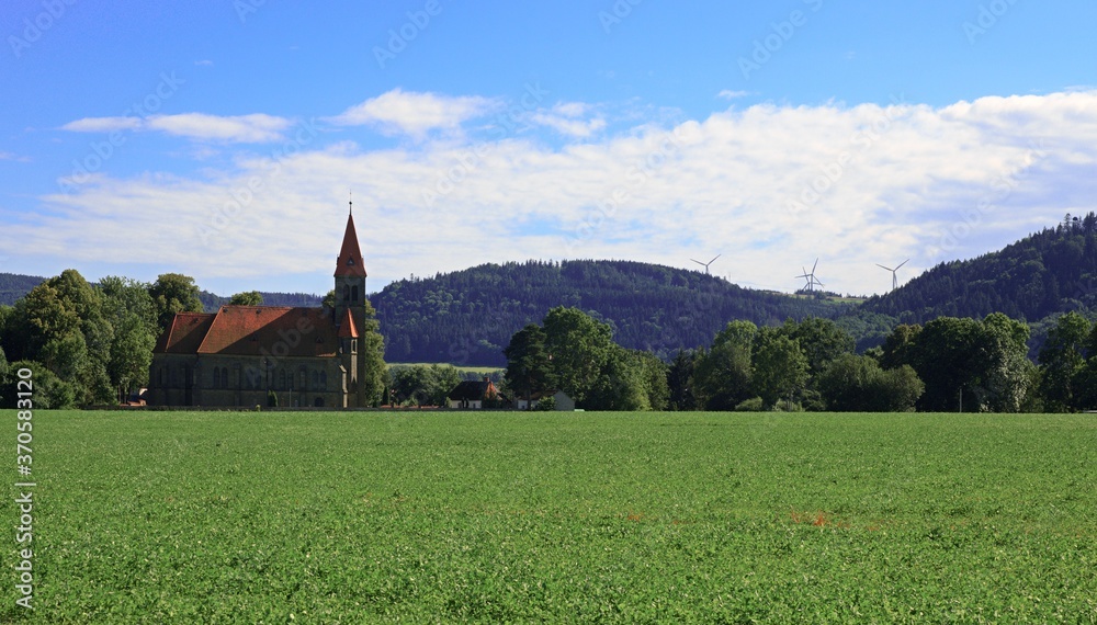 Old church and wind turbines