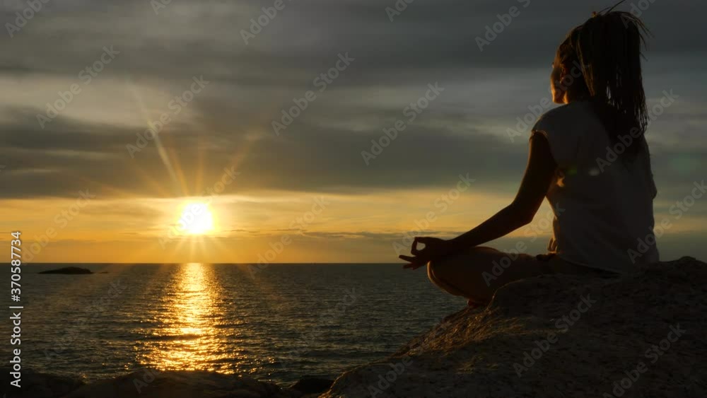 Serenity and yoga practicing by the sea in twilight sunset time, meditation Serenity and yoga practicing by the sea in twilight sunset time, meditation