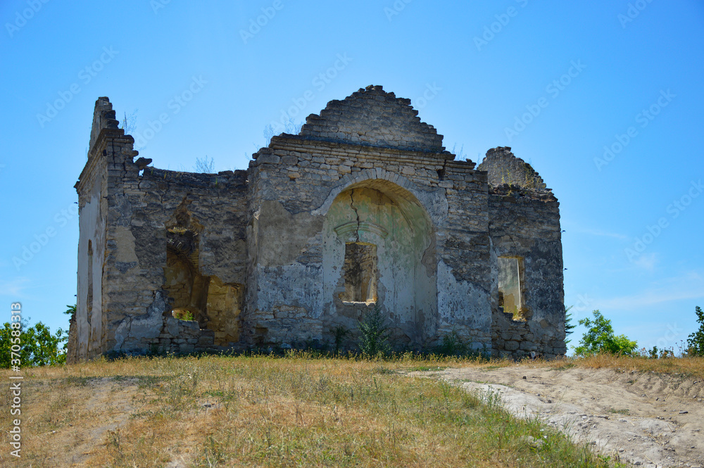 view of the old ruins of a small orthodox church, from above the blue sky