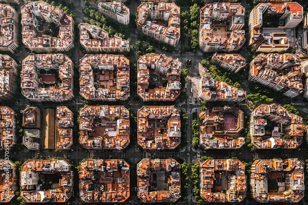 Obraz na płótnie Aerial view of typical buildings of Barcelona cityscape from helicopter. top view, Eixample residencial famous urban grid w salonie