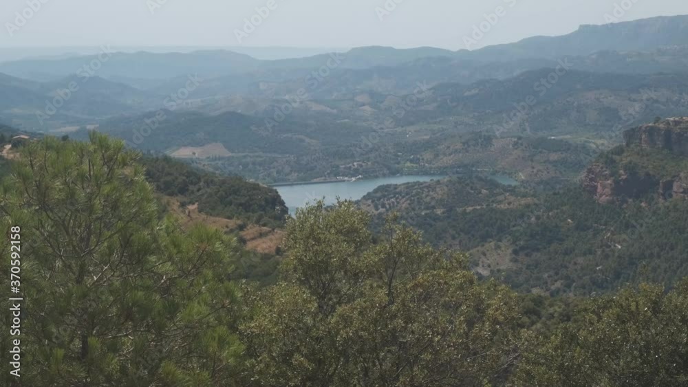 Views of the siurana swamp surrounded by mountains and with the blue sky on a summer day Views of the siurana swamp surrounded by mountains and with the blue sky on a summer day