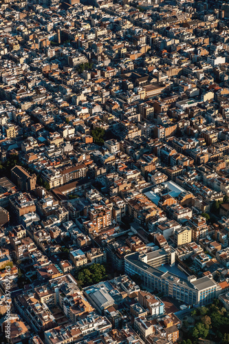 Aerial view of buildings of Barcelona cityscape from helicopter. top view © ikuday