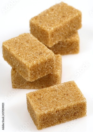 Brown Sugar, Cubes against White Background