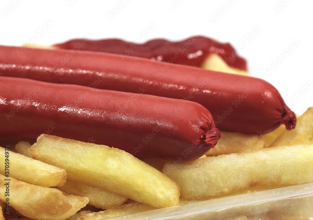 French Fries with Sausage and Ketchup against White Background