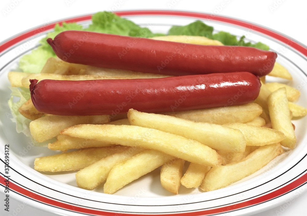 Plate with French Fries and Sausage against White Background Plate with French Fries and Sausage against White Background