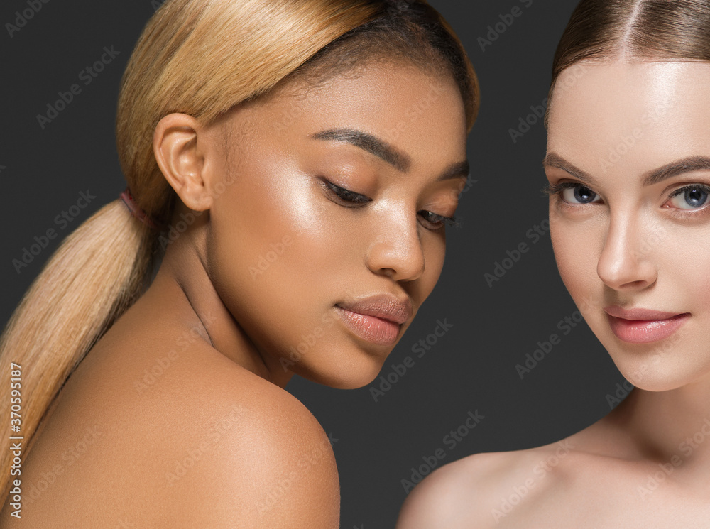 Different ethnic american african and caucasian woman beauty face portrait