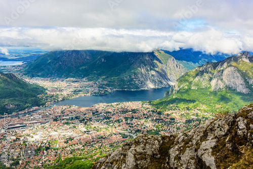View of the city of Lecco and Lake Como from the height of the mountain Resegone. Italy