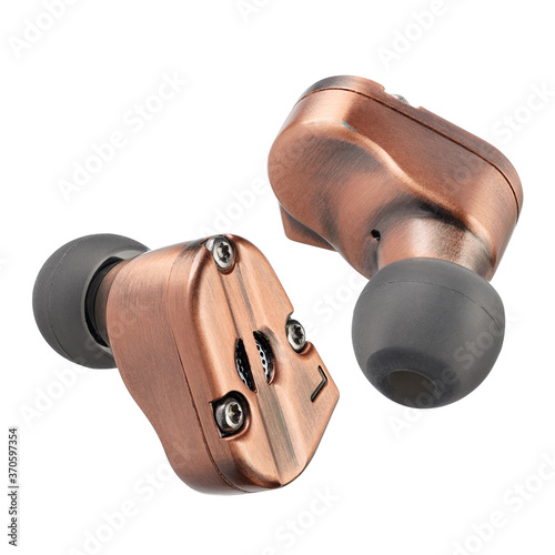 Copper hybrid dynamic driver balanced armature earbuds isolated.