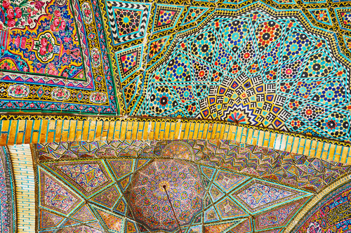 The complex patterns in Nasir Ol-Molk mosque, Shiraz, Iran photo