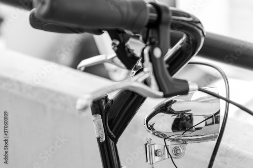  close up of bicycle in details, black and white photo