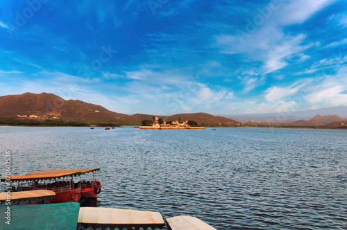 Jagmandir palace on an Island in Pichola Lake made of marble tiles, located in Udaipur city in Rajasthan state, India photo