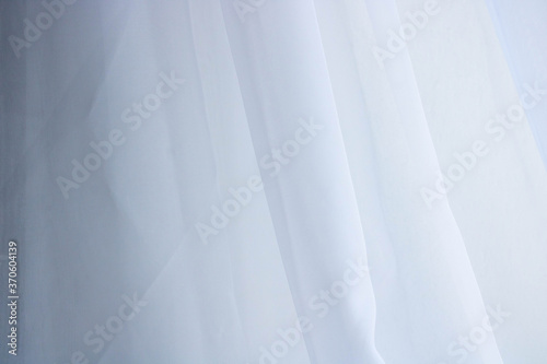 White beautiful elegant wavy light luxury fabric. Fabric texture, abstract background design