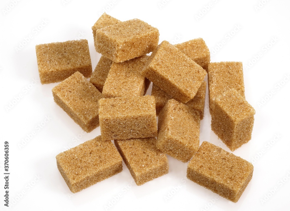 Cubes of Brown Sugar against White Background Cubes of Brown Sugar against White Background