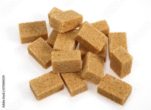 Cubes of Brown Sugar against White Background