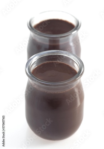 Glasses of Chocolate Cream against White Background