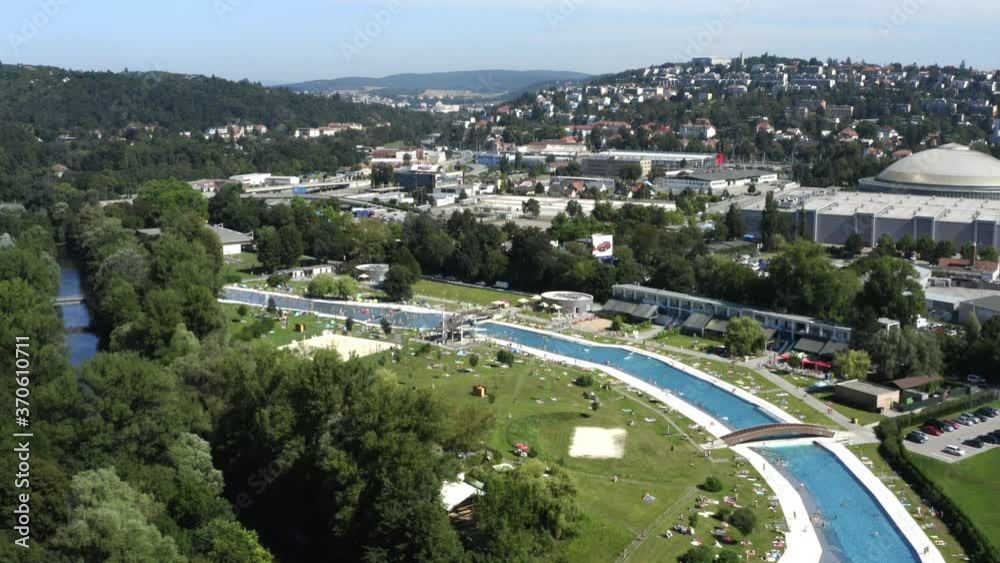 Crowds Of People At Public Swimming Pool During Summer, Brno Skyline Crowds Of People At Public Swimming Pool During Summer, Brno Skyline