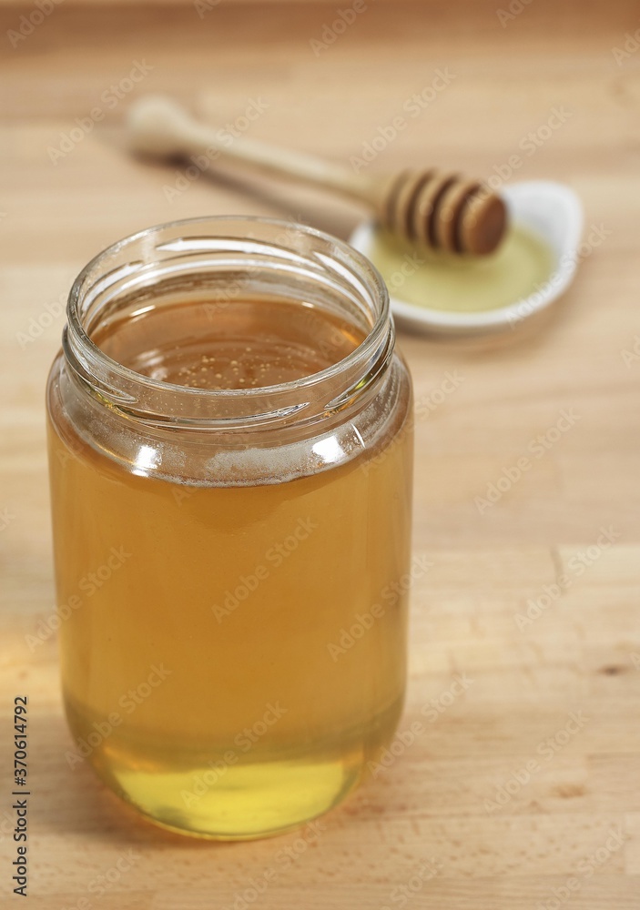 Jar of Honey against White Background Jar of Honey against White Background