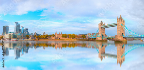 Panorama of the Tower Bridge  Tower of London and modern skyline on Thames river  - London  United Kingdom
