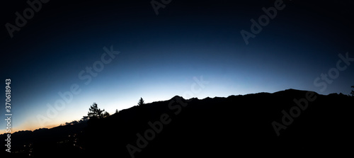 The silhouette of a mountain