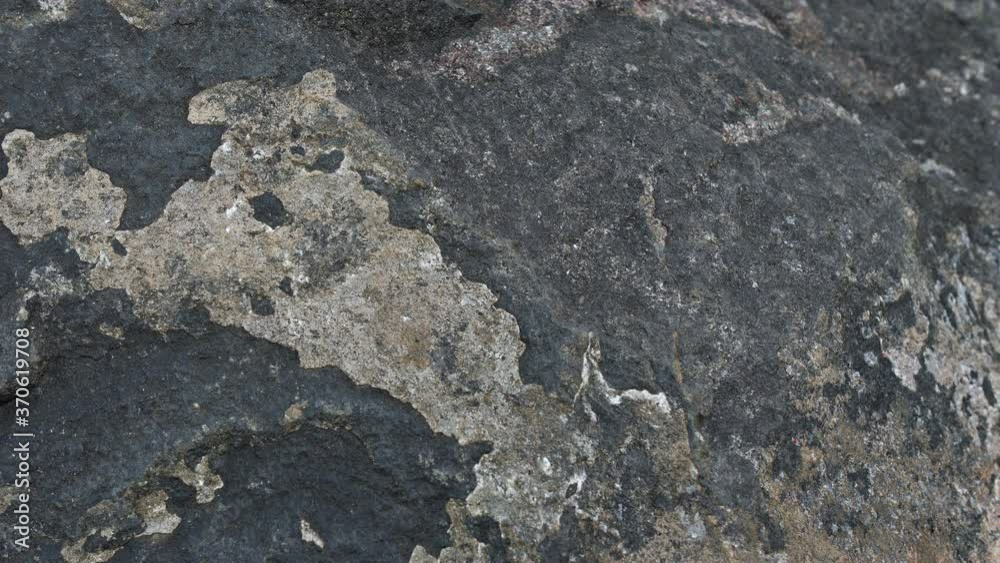 Raw cracked black stone with scarf texture Raw cracked black stone with scarf texture