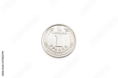 1 hryvnia coin close-up on a white isolated background. Ukrainian coins