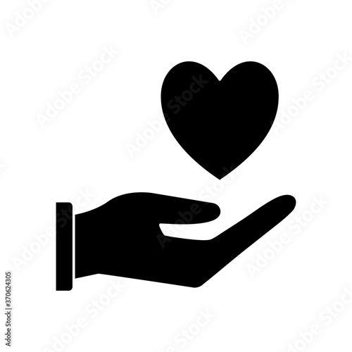 heart over hand silhouette style icon design of Charity and donation theme Vector illustration